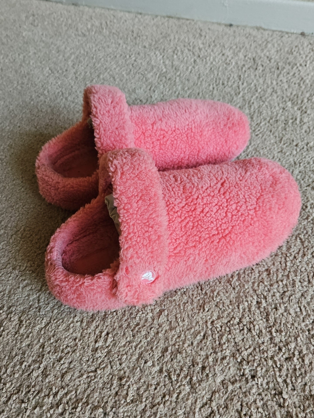CROCS Kids Fuzzy Slip-On Slippers in Coral Pink